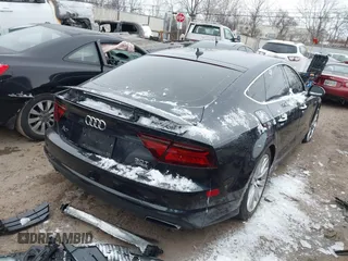 2016 Audi A7 3.0 Premium Plus with VIN WAUWGAFC0GN006470, listed as a IAAI auction lot 41638615 with 104,040 mi miles. Bid and sale history available at carsss.com. Image 4.