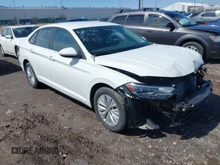 2019 Volkswagen Jetta S z VIN 3VWC57BU2KM027091, wystawiony jako IAAI lot #41971660 z przebiegiem 132 298 mil mil oraz . Historia ofert i sprzedaży dostępna na DreamBid. Obrazek 1.