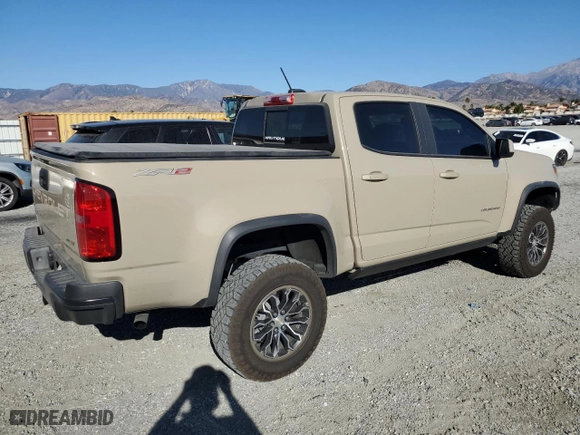 2022 Chevrolet Colorado 4WD ZR2 with VIN 1GCGTEEN4N1271054, listed as a Copart auction lot 87038104 with 13,697 mi miles and Salvage Title. Bid and sale history available at carsss.com. Image 3.