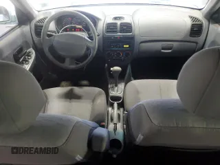 2005 Hyundai Accent GLS with VIN KMHCG45C15U602419, listed as a Copart auction lot 47759675 with 58,133 mi miles and Salvage Title. Bid and sale history available at carsss.com. Image 8.