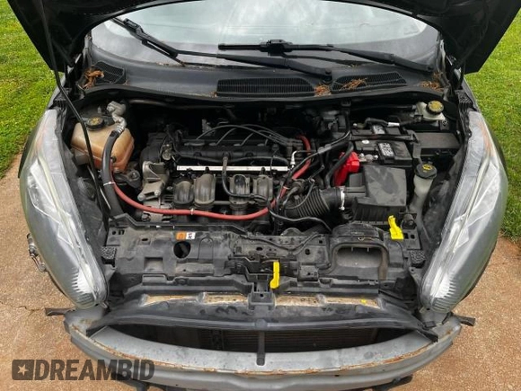 2016 Ford Fiesta S z VIN 3FADP4AJ8GM206305, wystawiony jako Copart lot #56752085 z przebiegiem 145 831 mil mil oraz Szkoda całkowita • Salvage title. Historia ofert i sprzedaży dostępna na DreamBid. Obrazek 7.