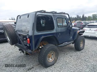 2004 Jeep Wrangler X z VIN 1J4FA39S44P725251, wystawiony jako IAAI lot #42249845 z przebiegiem 136 454 mil mil oraz . Historia ofert i sprzedaży dostępna na DreamBid. Obrazek 4.