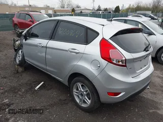 2017 Ford Fiesta SE with VIN 3FADP4EJ5HM104763, listed as a IAAI auction lot 42009697 with 117,980 mi miles. Bid and sale history available at carsss.com. Image 3.