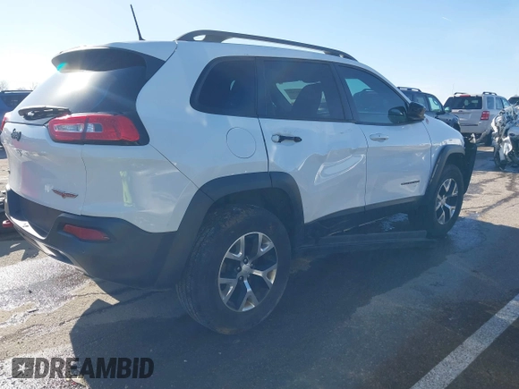 2018 Jeep Cherokee Trailhawk with VIN 1C4PJMBX7JD550173, listed as a IAAI auction lot 41094306 with 74,128 mi miles. Bid and sale history available at carsss.com. Image 4.