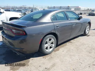 2020 Dodge Charger SXT with VIN 2C3CDXBG0LH117053, listed as a IAAI auction lot 41781124 with 165,590 mi miles and . Bid and sale history available at carsss.com. Image 4.