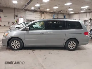 2009 Honda Odyssey EX-L with VIN 5FNRL38789B015524, listed as a IAAI auction lot 42135465 with 242,005 mi miles. Bid and sale history available at carsss.com. Image 12.