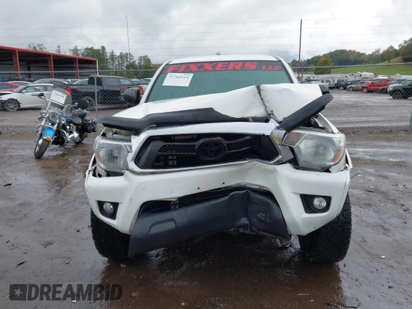 2014 Toyota Tacoma with VIN 3TMLU4EN9EM140999, listed as a IAAI auction lot 37765514 with 168,875 mi miles. Bid and sale history available at carsss.com. Image 12.