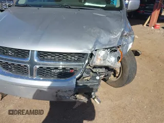 2015 Dodge Grand Caravan SXT with VIN 2C4RDGCG1FR649074, listed as a IAAI auction lot 41759409 with 116,856 mi miles and . Bid and sale history available at DreamBid. Image 6.