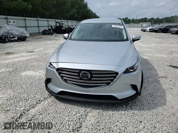 2022 Mazda CX-9 Touring with VIN JM3TCBCY6N0607357, listed as a Copart auction lot 54316745 with 66,888 mi miles and Salvage title. Bid and sale history available at DreamBid. Image 14.