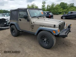2004 Jeep Wrangler Rubicon z VIN 1J4FA69S24P713388, wystawiony jako Copart lot #61196515 z przebiegiem 155 092 mil mil oraz Czysty tytuł • Clean title. Historia ofert i sprzedaży dostępna na DreamBid. Obrazek 4.