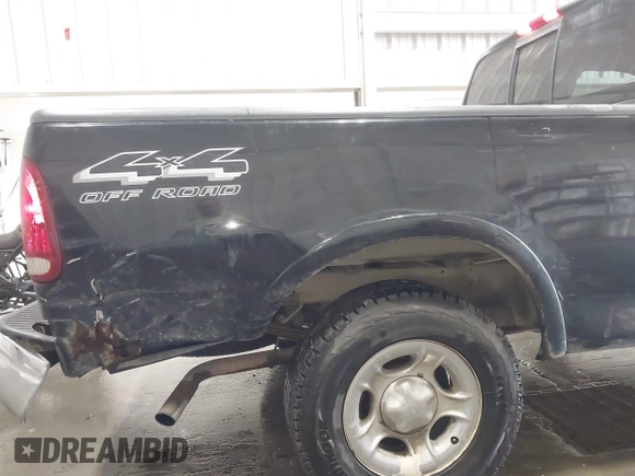1999 Ford F-150 with VIN 1FTRX18W0XNB70955, listed as a IAAI auction lot 42692083 with Not provided miles and . Bid and sale history available at DreamBid. Image 6.