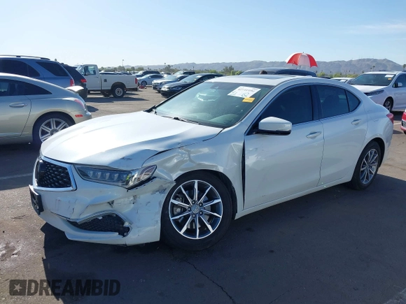2019 Acura TLX with VIN 19UUB1F39KA011290, listed as a IAAI auction lot 42110094 with 63,450 mi miles and . Bid and sale history available at carsss.com. Image 2.