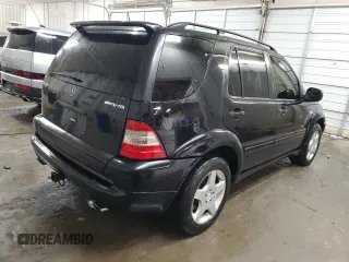 2000 Mercedes-Benz M-Class AMG with VIN 4JGAB74EXYA219143, listed as a Copart auction lot 71922634 with 156,092 mi miles and Salvage Title. Bid and sale history available at carsss.com. Image 3.