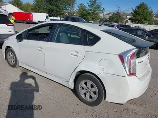 2012 Toyota Prius One with VIN JTDKN3DU2C1520448, listed as a IAAI auction lot 42108210 with 141,657 mi miles. Bid and sale history available at carsss.com. Image 3.
