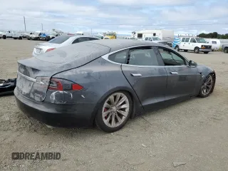 2016 Tesla Model S 90D z VIN 5YJSA1E41GF171522, wystawiony jako Copart lot #59966545 z przebiegiem Nie podano mil oraz Szkoda całkowita • Salvage title. Historia ofert i sprzedaży dostępna na DreamBid. Obrazek 3.