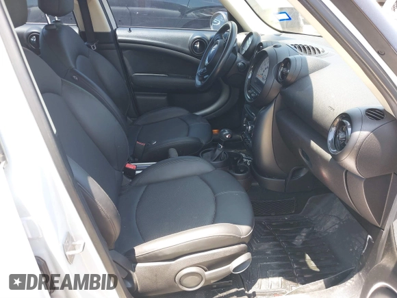 2014 MINI Countryman S with VIN WMWZC3C54EWP27859, listed as a IAAI auction lot 39592610 with 105,264 mi miles and . Bid and sale history available at DreamBid. Image 5.
