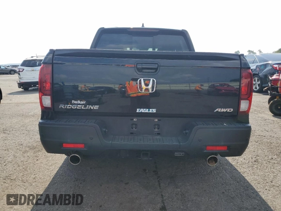2022 Honda Ridgeline RTL-E with VIN 5FPYK3F7XNB023787, listed as a Copart auction lot 66883515 with 49,786 mi miles and Salvage title. Bid and sale history available at DreamBid. Image 6.