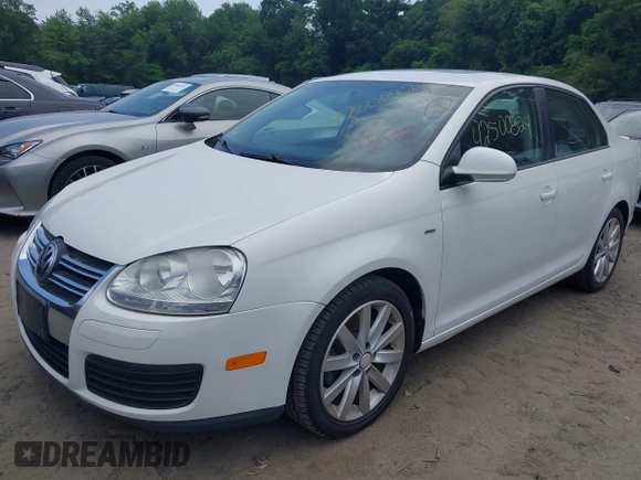 2010 Volkswagen Jetta Wolfsburg Edition with VIN 3VWRJ7AJ1AM152563, listed as a IAAI auction lot 42500824 with 165,125 mi miles and . Bid and sale history available at DreamBid. Image 2.