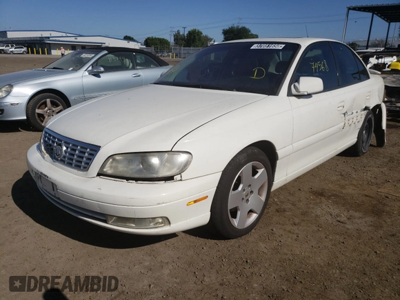 2001 Cadillac Catera z VIN W06VR54RX1R070430, wystawiony jako Copart lot #37051650 z przebiegiem 74 568 mil mil oraz Szkody całkowita. Historia ofert i sprzedaży dostępna na DreamBid. Obrazek 2.