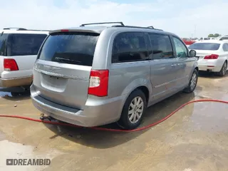 2014 Chrysler Town & Country Touring with VIN 2C4RC1BG0ER437492, listed as a IAAI auction lot 41981784 with 240,445 mi miles. Bid and sale history available at carsss.com. Image 4.