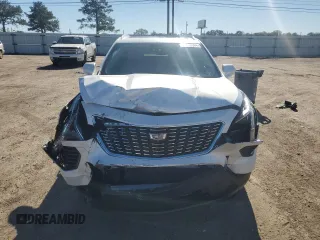 2022 Cadillac XT4 FWD Luxury с VIN 1GYAZAR48NF105857, выставлен на аукционе Copart как лот 81263584 с пробегом 17 352 миль миль и На запчасти • Non repairable. История ставок и продаж доступна на DreamBid. Изображение 5.