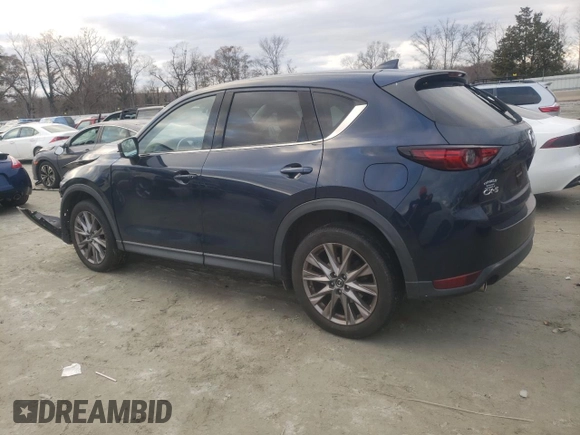 2020 Mazda CX-5 Grand Touring with VIN JM3KFADM4L1783968, listed as a Copart auction lot 85994244 with 89,074 mi miles and Salvage Title. Bid and sale history available at DreamBid. Image 2.