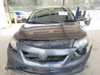 2009 Toyota Corolla with VIN 1NXBU40E29Z028660, listed as a IAAI auction lot 42025186 with 218,285 mi miles. Bid and sale history available at carsss.com. Image 6.