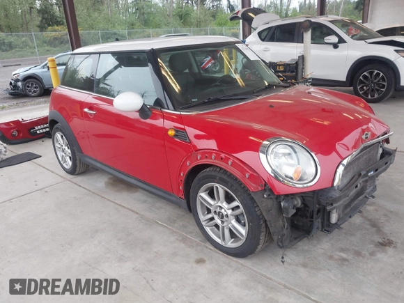 2012 MINI Hardtop with VIN WMWSU3C58CT262077, listed as a IAAI auction lot 42140178 with 70,099 mi miles and . Bid and sale history available at DreamBid. Image 1.