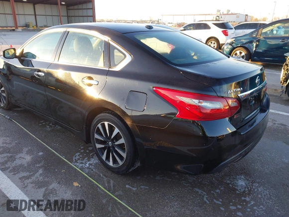 2018 Nissan Altima SR with VIN 1N4AL3AP7JC129741, listed as a IAAI auction lot 40923554 with 161,218 mi miles and . Bid and sale history available at carsss.com. Image 3.