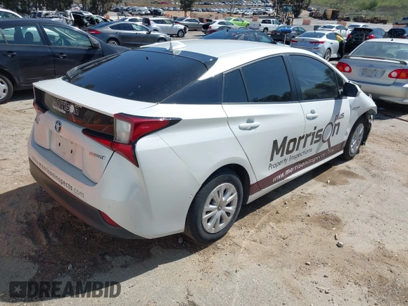 2021 Toyota Prius L Eco with VIN JTDKAMFU8M3133925, listed as a IAAI auction lot 41966660 with 115,193 mi miles. Bid and sale history available at carsss.com. Image 4.