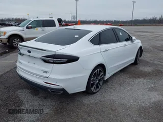 2019 Ford Fusion Titanium with VIN 3FA6P0D9XKR186685, listed as a IAAI auction lot 39181239 with Not provided miles and . Bid and sale history available at DreamBid. Image 4.
