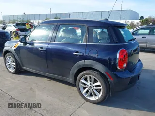 2014 MINI Countryman with VIN WMWZB3C50EWR42268, listed as a IAAI auction lot 41845750 with 117,192 mi miles and . Bid and sale history available at DreamBid. Image 3.