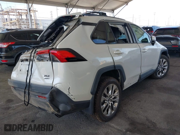 2021 Toyota RAV4 XLE Premium z VIN 2T3A1RFV1MW153237, wystawiony jako IAAI lot #42519130 z przebiegiem 52 471 mil mil oraz . Historia ofert i sprzedaży dostępna na DreamBid. Obrazek 4.