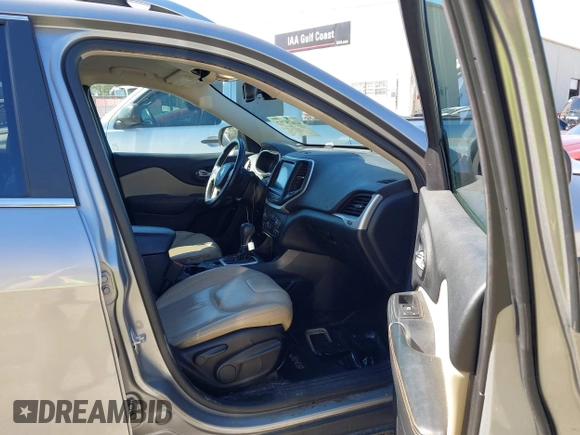 2016 Jeep Cherokee Limited with VIN 1C4PJLDB8GW239294, listed as a IAAI auction lot 41675712 with 140,491 mi miles. Bid and sale history available at carsss.com. Image 5.