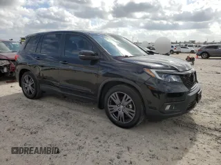 2021 Honda Passport EX-L with VIN 5FNYF7H53MB016100, listed as a Copart auction lot 82453154 with 24,772 mi miles and Salvage Title. Bid and sale history available at carsss.com. Image 4.
