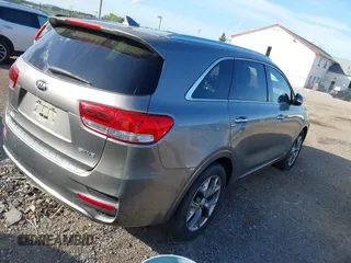 2016 Kia Sorento SX with VIN 5XYPKDA51GG031823, listed as a IAAI auction lot 42142495 with 87,132 mi miles. Bid and sale history available at carsss.com. Image 4.