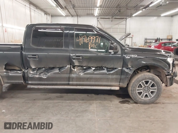 2015 Ford F-150 XLT w/HD Payload Pkg with VIN 1FTFW1EGXFFA39852, listed as a IAAI auction lot 41769971 with 163,929 mi miles. Bid and sale history available at carsss.com. Image 6.