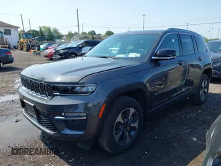 2022 Jeep Grand Cherokee with VIN 1C4RJYB67N8716360, listed as a IAAI auction lot 42464479 with 17,208 mi miles and . Bid and sale history available at DreamBid. Image 2.