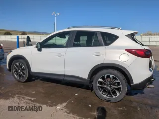 2016 Mazda CX-5 Grand Touring with VIN JM3KE4DY8G0671256, listed as a Copart auction lot 52920975 with 87,822 mi miles and Non Repairable. Bid and sale history available at carsss.com. Image 2.