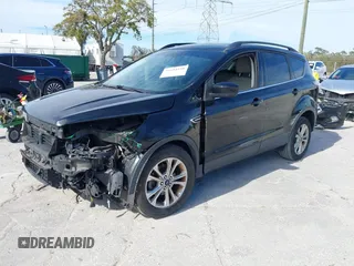 2017 Ford Escape SE with VIN 1FMCU0GDXHUB56573, listed as a IAAI auction lot 41694558 with 145,902 mi miles. Bid and sale history available at carsss.com. Image 2.