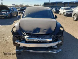 2022 Tesla Model Y Performance z VIN 7SAYGDEF3NF446769, wystawiony jako Copart lot #83702074 z przebiegiem 32 895 mil mil oraz Szkoda całkowita • Salvage title. Historia ofert i sprzedaży dostępna na DreamBid. Obrazek 5.