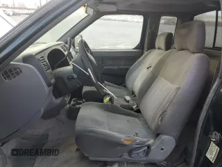 1999 Nissan Frontier XE with VIN 1N6DD26S6XC332458, listed as a Copart auction lot 48028715 with 182,706 mi miles and Salvage title. Bid and sale history available at DreamBid. Image 7.