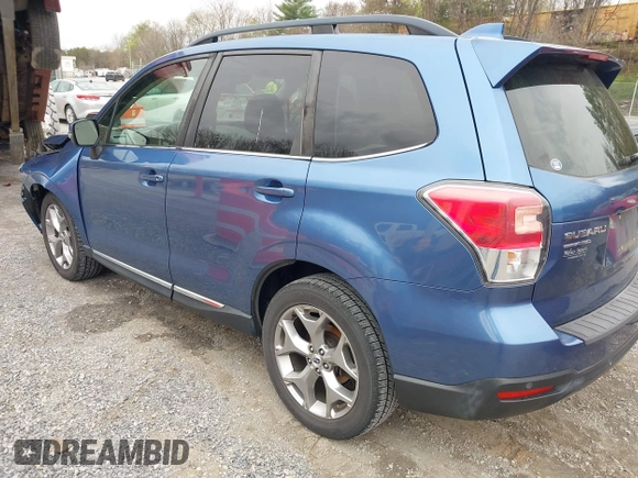 2017 Subaru Forester Touring with VIN JF2SJAWC1HH443799, listed as a IAAI auction lot 41943045 with 122,213 mi miles and . Bid and sale history available at DreamBid. Image 3.
