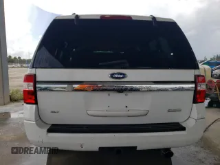 2015 Ford Expedition EL XLT with VIN 1FMJK1HTXFEF13525, listed as a Copart auction lot 68974014 with 69,489 mi miles and Salvage Title. Bid and sale history available at carsss.com. Image 6.