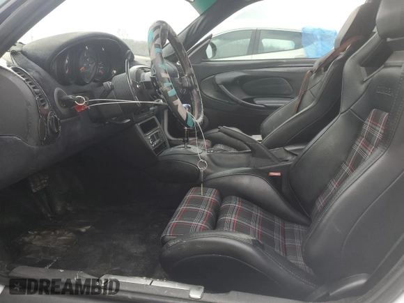 1999 Porsche 911 z VIN WP0AA299XXS623462, wystawiony jako Copart lot #85549554 z przebiegiem Nie podano mil oraz Szkoda całkowita • Salvage title. Historia ofert i sprzedaży dostępna na DreamBid. Obrazek 7.