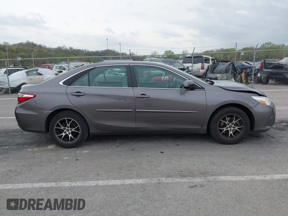 2015 Toyota Camry XLE with VIN 4T4BF1FK5FR483736, listed as a IAAI auction lot 41933106 with 104,468 mi miles. Bid and sale history available at carsss.com. Image 13.