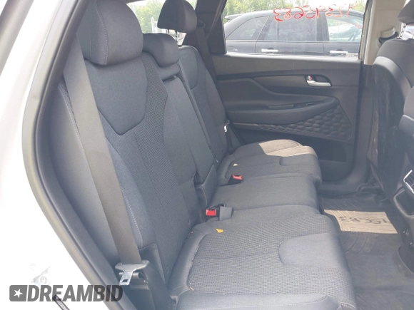 2019 Hyundai Santa Fe SE z VIN 5NMS2CAD2KH058961, wystawiony jako IAAI lot #42395683 z przebiegiem 81 228 mil mil oraz . Historia ofert i sprzedaży dostępna na DreamBid. Obrazek 8.