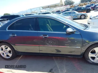 2006 Acura RL z VIN JH4KB16516C004396, wystawiony jako IAAI lot #41959850 z przebiegiem 114 670 mil mil oraz . Historia ofert i sprzedaży dostępna na DreamBid. Obrazek 12.