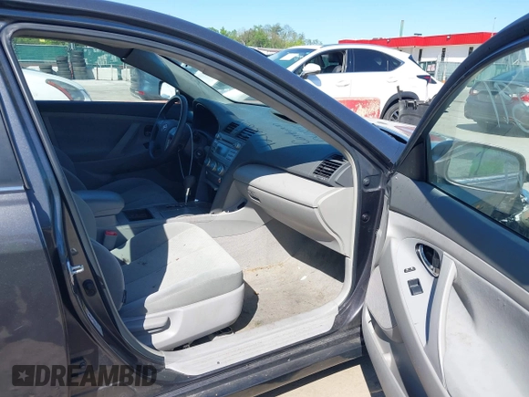 2007 Toyota Camry CE with VIN 4T1BE46K07U638516, listed as a IAAI auction lot 42128391 with 168,649 mi miles. Bid and sale history available at carsss.com. Image 5.