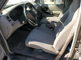 1999 Mazda B-Series 2WD Truck SX with VIN 4F4YR12C7XTM27567, listed as a Copart auction lot 82409904 with 226,366 mi miles and Salvage Title. Bid and sale history available at carsss.com. Image 7.